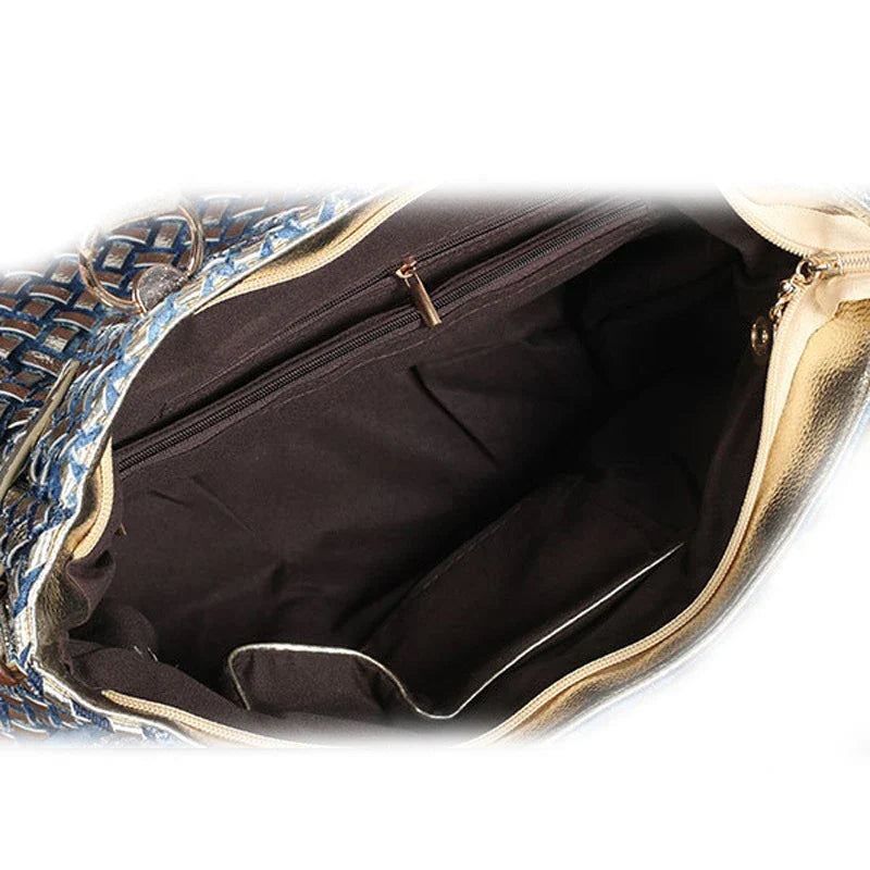 Silver diamond-studded denim messenger bag with adjustable strap and zippered main compartment