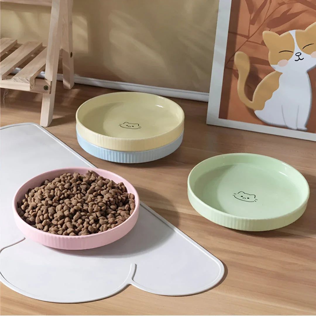 Adorable ceramic pet food and water bowl in pink color, perfect for cats and small dogs