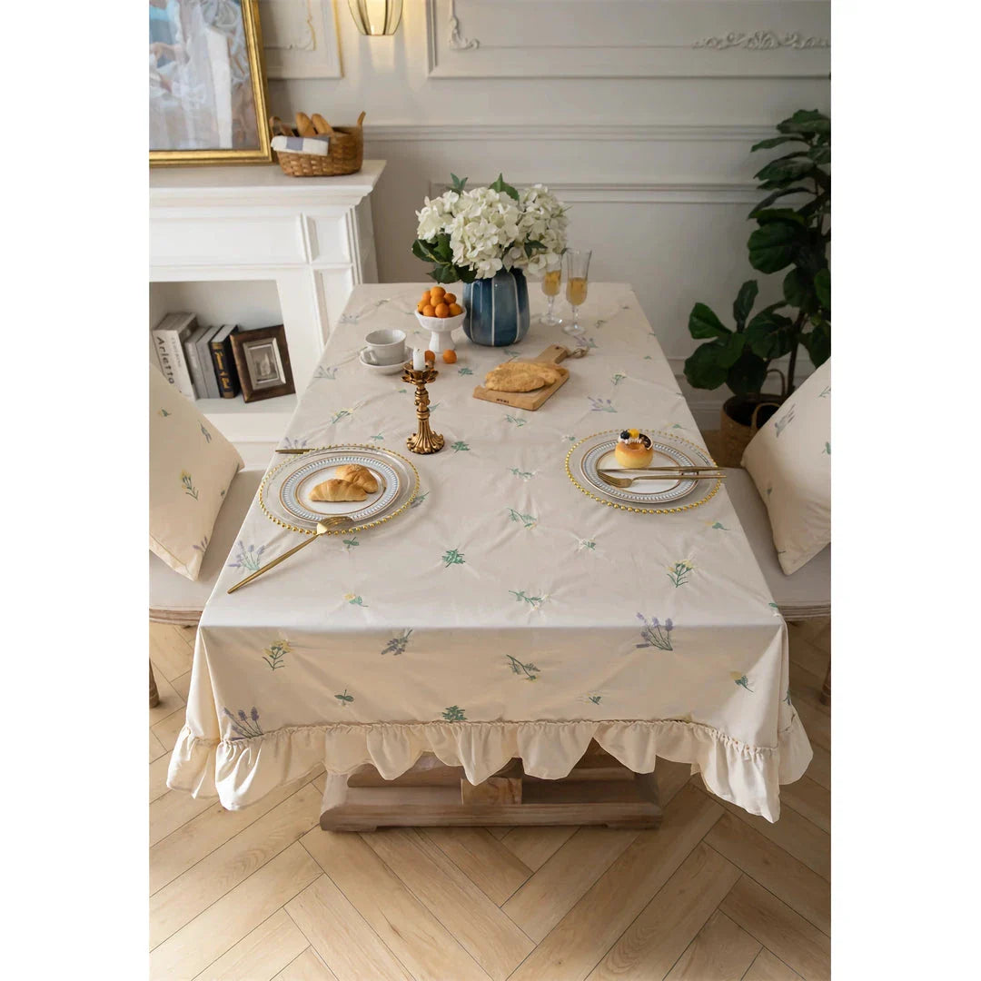Elegant cotton tablecloth with apricot embroidery and lotus leaf edge, perfect for dining decor