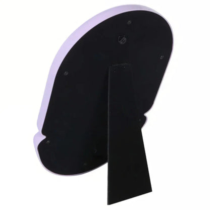 Elegant oval-shaped tabletop mirror with a sleek black plastic frame, perfect for adding a touch of sophistication to any room.