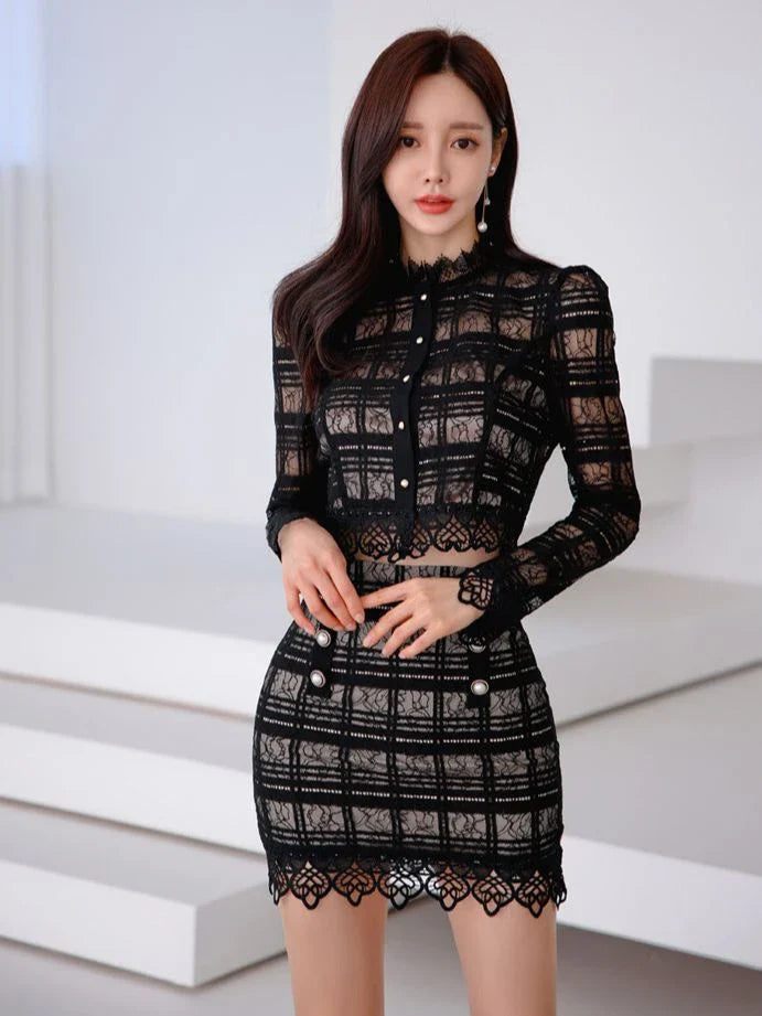 Elegant lace two-piece suit with Chanel-inspired design, featuring a long-sleeved top and short skirt in a sophisticated white color.