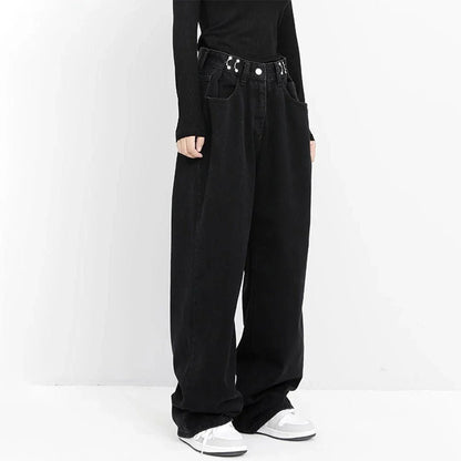 A pair of high-waist black jeans with a relaxed wide-leg design, perfect for effortless style and comfort.