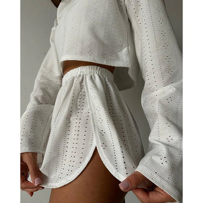 Trendha Women's Long Sleeve Pullover Top and Shorts Set in White, featuring a chic hollow-out design and flattering slim fit