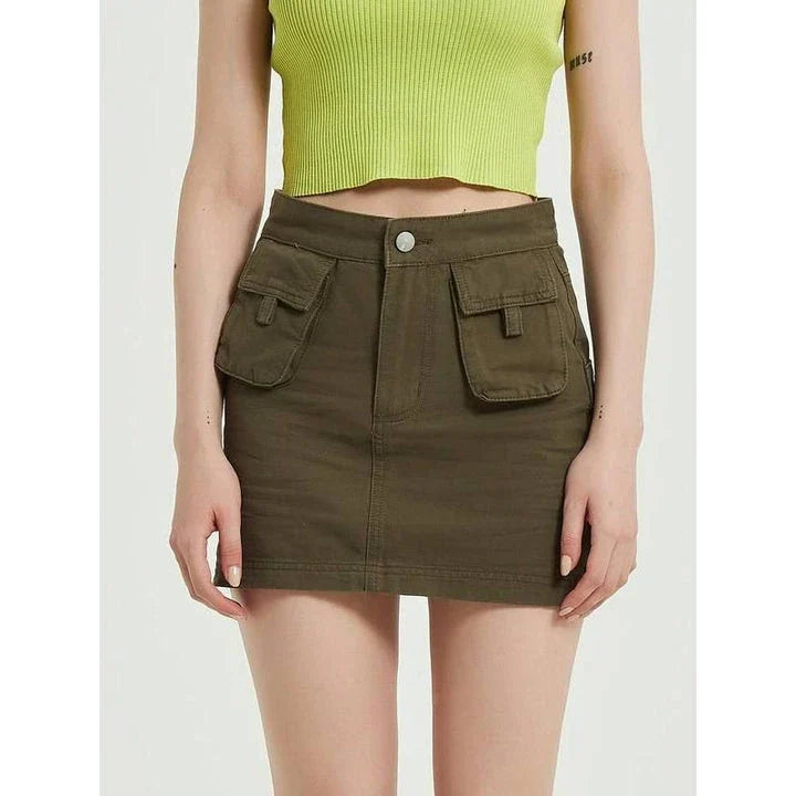 Chic green denim high-waist pencil skirt with convenient pockets, offering a flattering and versatile look for any occasion.