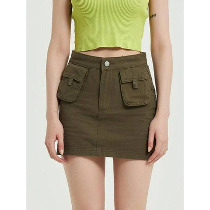 Chic green denim high-waist pencil skirt with convenient pockets, offering a flattering and versatile look for any occasion.