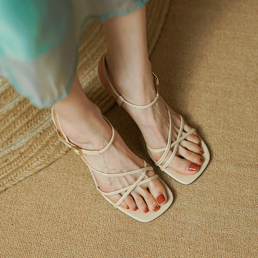 Elegant square high heel sandals for women in beige color with a stylish buckle closure and a cushioned insole for comfort