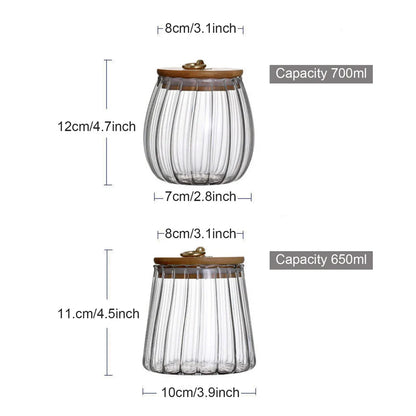 Elegant glass canisters with flower-shaped metal handles and airtight bamboo lids for stylish kitchen storage