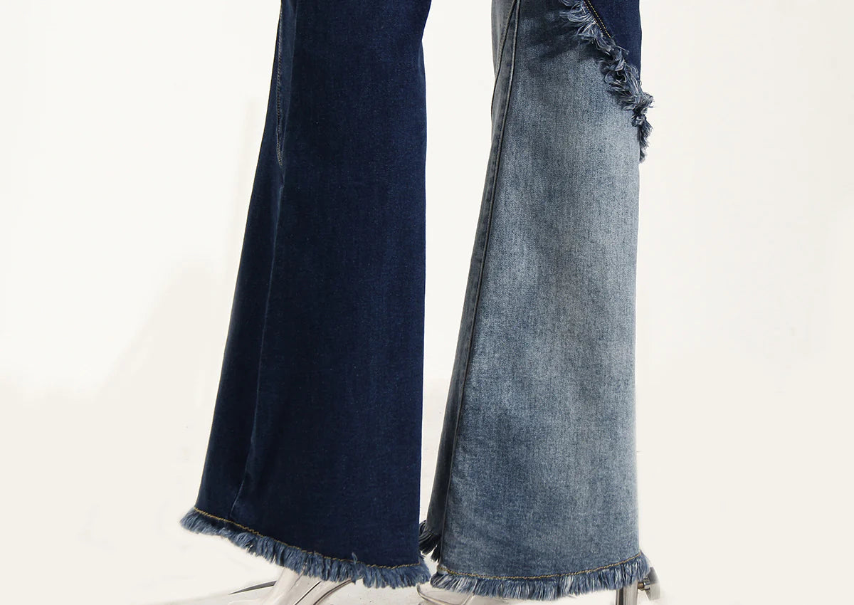 Geometric raw edge jeans with high-waisted, slimming design in blue denim