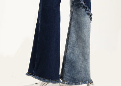 Geometric raw edge jeans with high-waisted, slimming design in blue denim