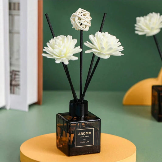 Luxurious jasmine-scented reed diffuser set with decorative plastic flower, providing a soothing and elegant ambiance