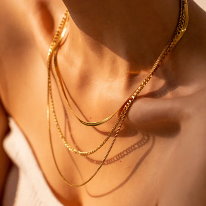 Elegant 18K gold plated stainless steel flat snake chain necklace with letter charms for a unique, personalized look