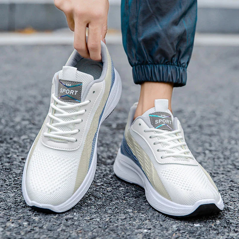 Breathable, comfortable color-blocked mesh sneakers for men with a durable rubber sole and secure lace-up closure