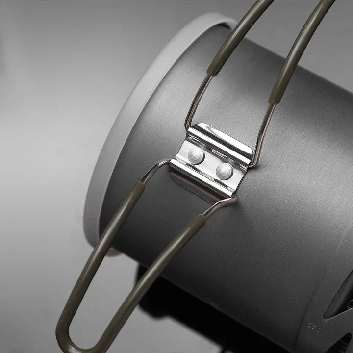 Compact Heat Exchanger Pot with efficient heat exchange design, foldable and lightweight construction, and durable hard-anodized aluminum build