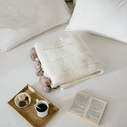 Cozy chenille ball-knit wool blanket in pink, gray, and white colors