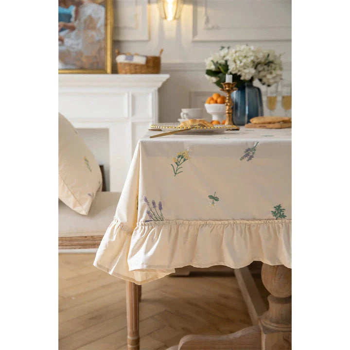 Elegant cotton tablecloth with apricot embroidery and lotus leaf edge, perfect for dining decor