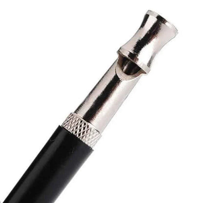 Compact dog training whistle made of metal and plastic with a black and silver design