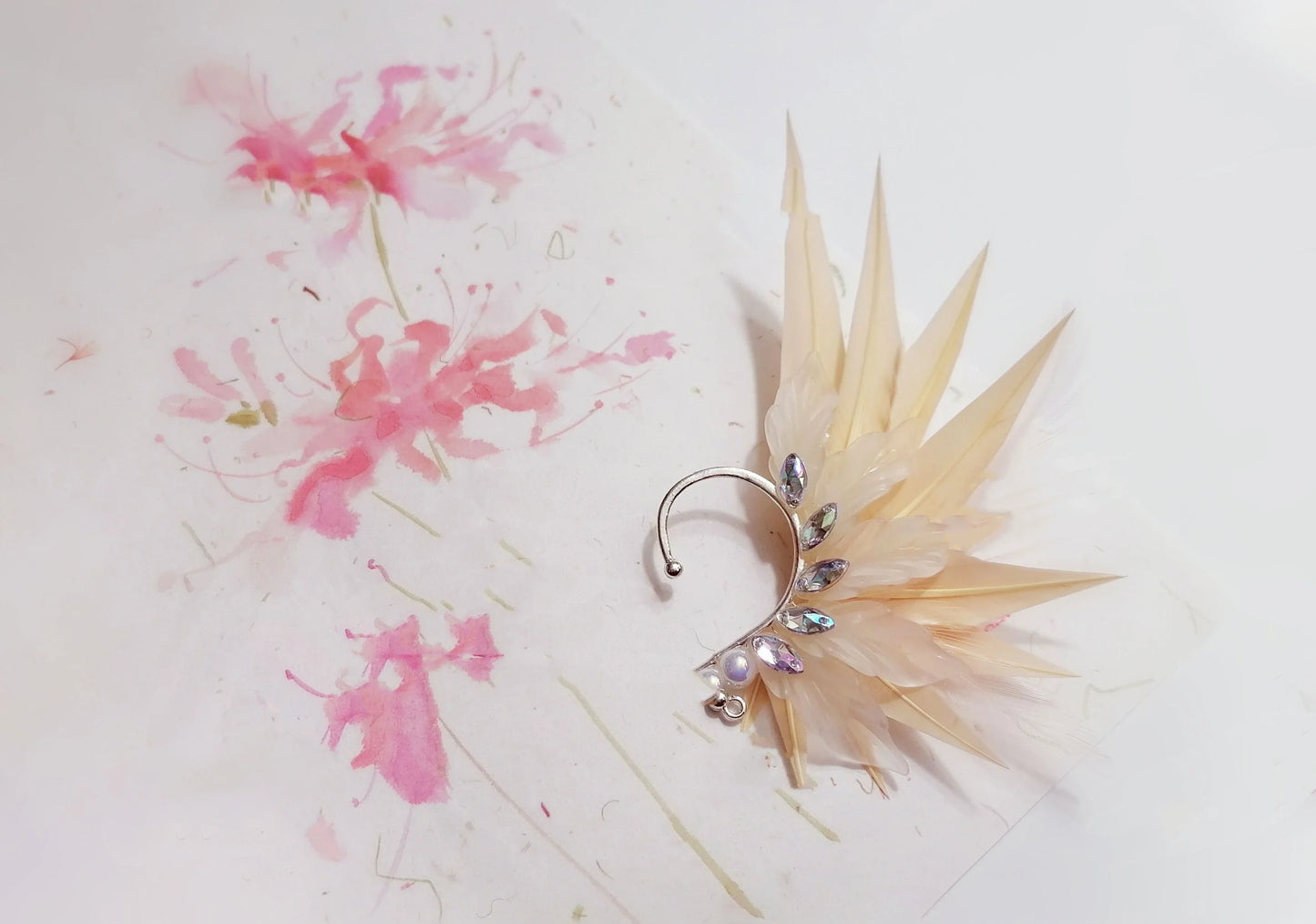 Elegant feather earrings with delicate angel wing design in various color options