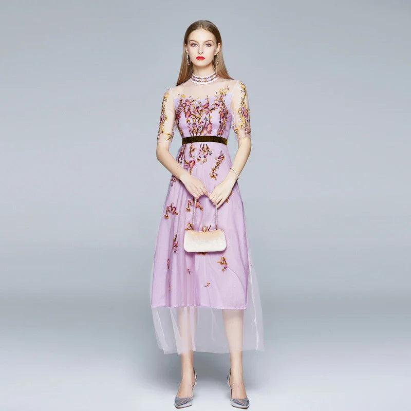 Elegant ladies' dress with embroidered mesh pattern, five-point sleeves, and flowing long skirt