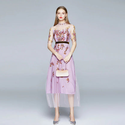 Elegant ladies' dress with embroidered mesh pattern, five-point sleeves, and flowing long skirt