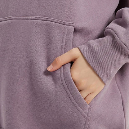 Cozy Fleece Hoodie and Sweatpants Set in Light Pink, featuring a relaxed fit and hooded design for maximum comfort and style.