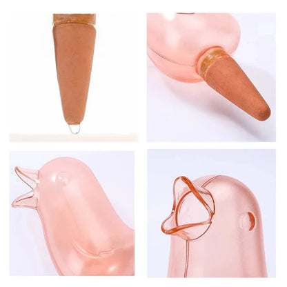 Automatic bird-shaped plant waterer in blue and red colors, designed to keep plants hydrated with a transparent design and slow-release watering mechanism.