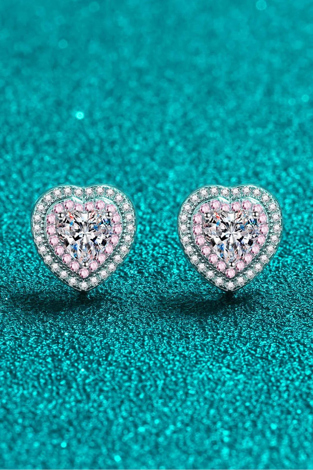 Elegant silver moissanite heart-shaped stud earrings with sparkling zircon accents
