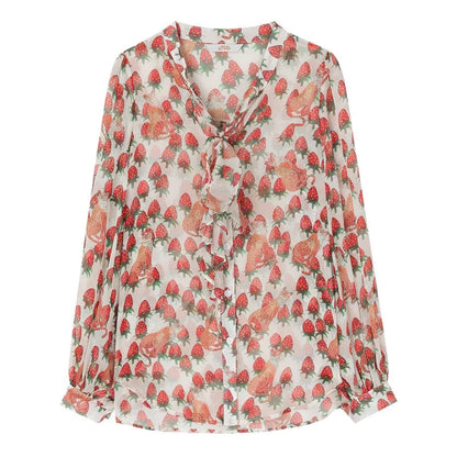 Elegant floral chiffon blouse with lantern sleeves, featuring a vibrant floral pattern and a delicate bow collar
