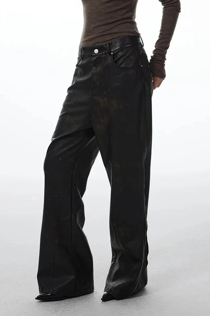 Model wearing chic high-waist straight leg leather pants in black color