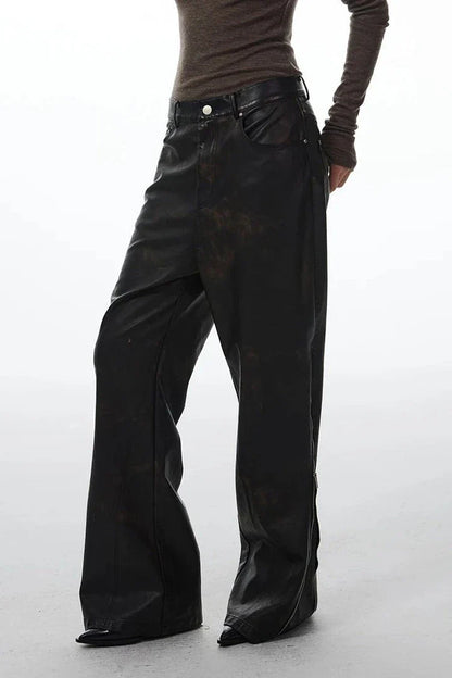 Model wearing chic high-waist straight leg leather pants in black color