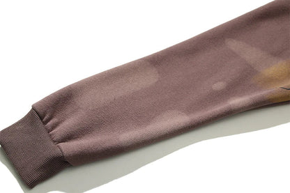 Cozy loose knit sweaters in a rich coffee color with a relaxed, oversized fit for ultimate comfort and style.