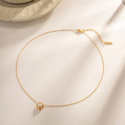 Elegant stainless steel pearl pendant necklace with a geometric design, perfect for women's fashion and everyday style.