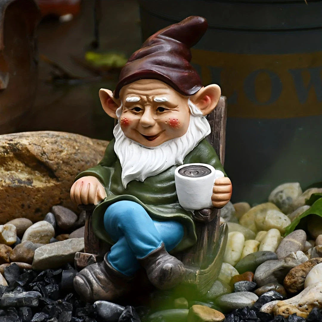 Charming outdoor garden gnome decoration made of durable resin, featuring a relaxing gnome on a rocking chair