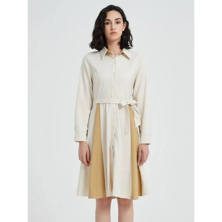 Elegant beige A-line dress with long sleeves, turn-down collar, and included belt for a flattering silhouette