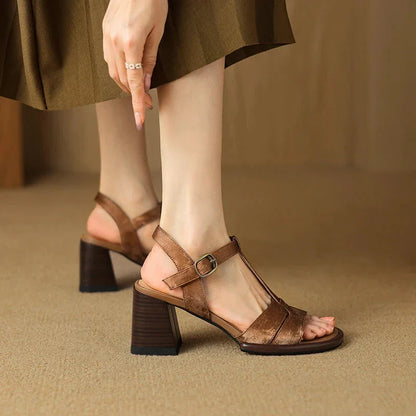 Genuine leather gladiator sandals with chunky heel, open-toe design, and secure buckle strap closure for summer style
