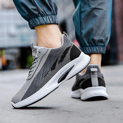 Breathable, comfortable color-blocked mesh sneakers for men with a durable rubber sole and secure lace-up closure