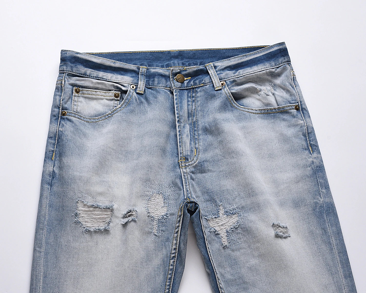Premium distressed denim jeans with ripped detailing, perfect for casual streetwear style