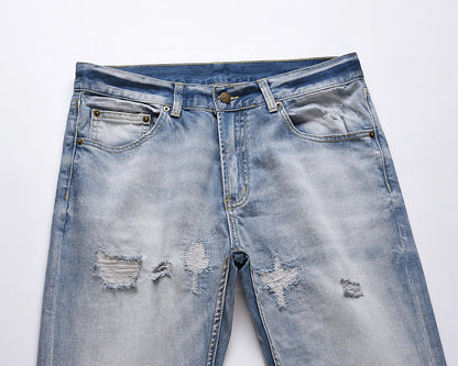 Premium distressed denim jeans with ripped detailing, perfect for casual streetwear style