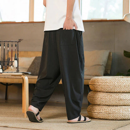 Men's Chinese-inspired harem pants made of luxurious ice silk fabric with a relaxed, draped silhouette