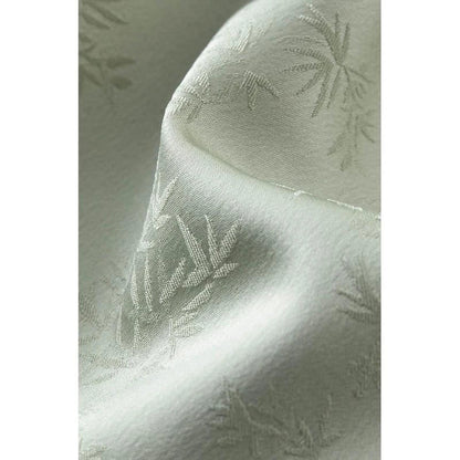 Elegant mint green midi dress with spaghetti straps, featuring a slim fit and intricate embroidery details