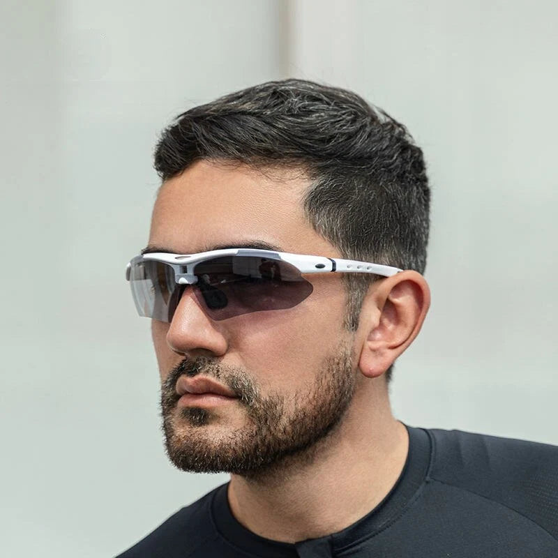 Pair of high-performance polarized sports sunglasses with interchangeable lenses for outdoor activities and sports