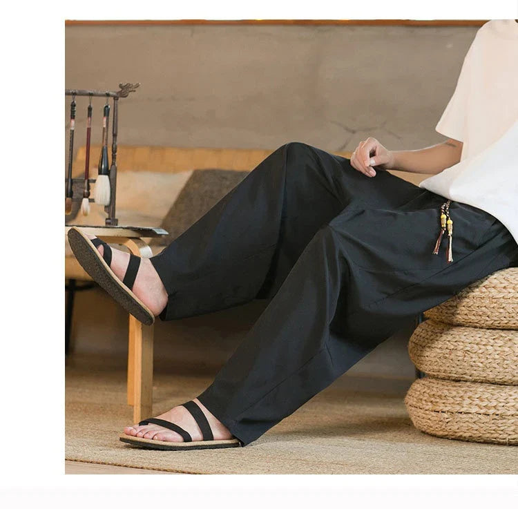 Men's Chinese-inspired harem pants made of luxurious ice silk fabric with a relaxed, draped silhouette