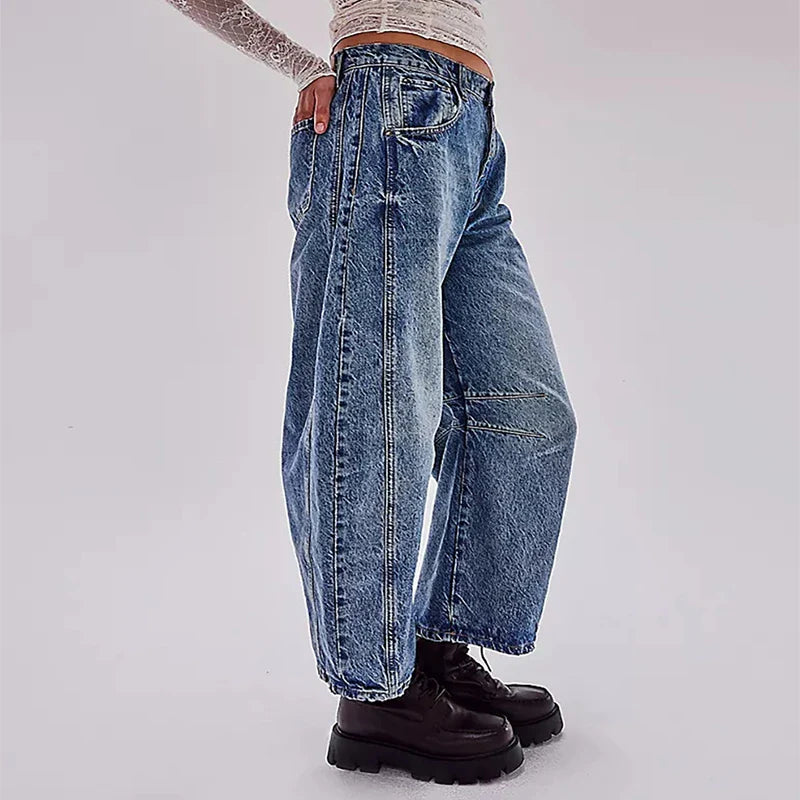 Trendha wide-leg summer pants in light blue, white, and black colors with a relaxed, stylish design