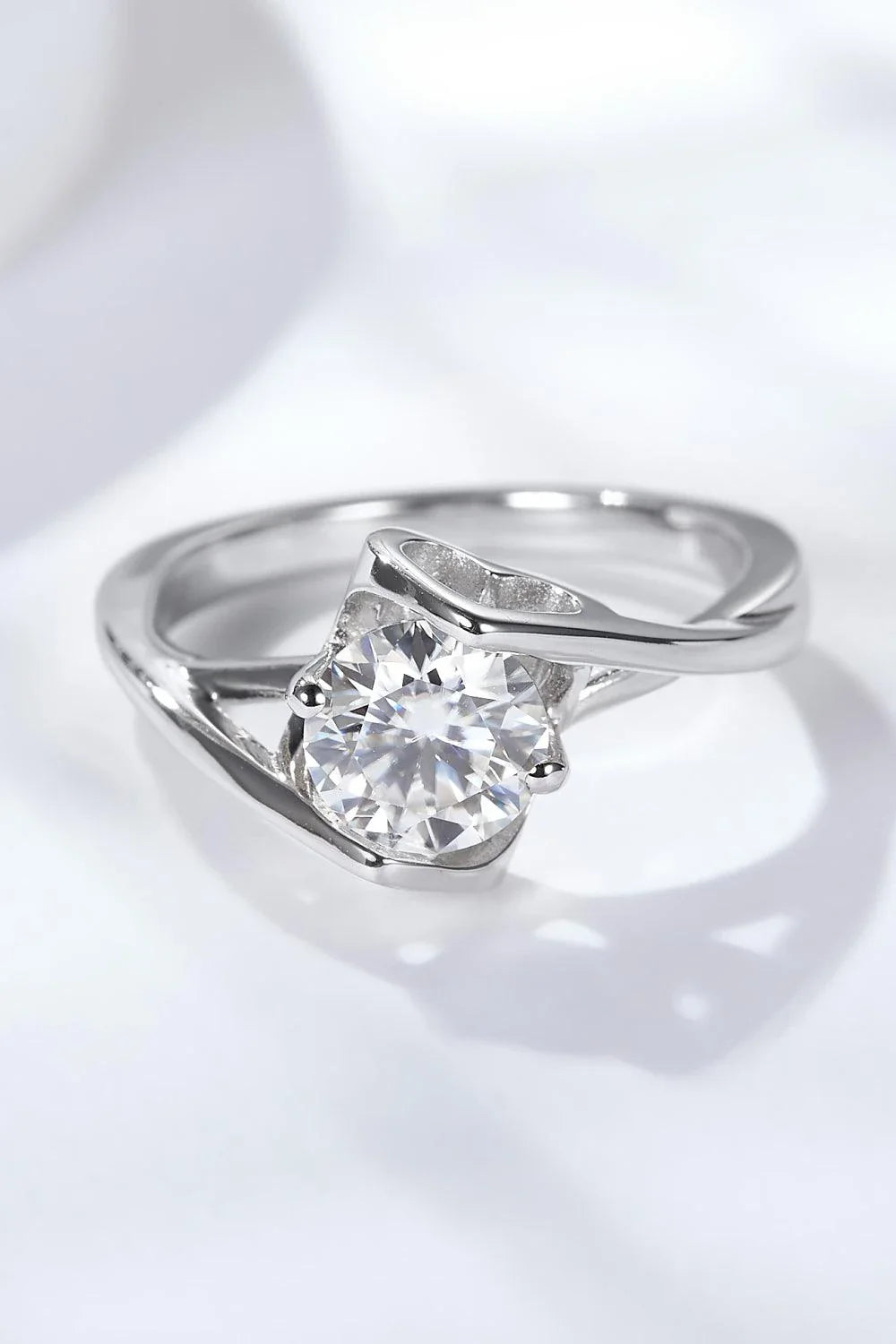 Elegant 1 Carat Moissanite Ring in 925 Sterling Silver, featuring a dazzling center stone and a sleek, minimalist design