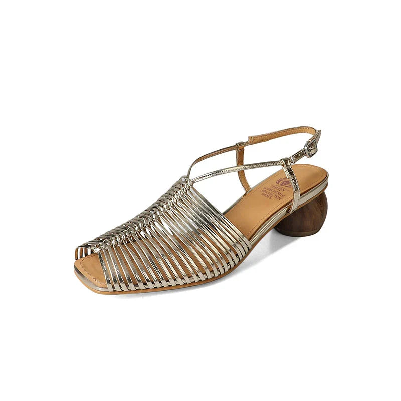 Stylish high heel genuine leather sandals in silver color with ankle strap and fashionable buckle closure