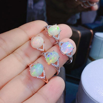 Elegant 925 silver ring featuring a captivating natural Australian opal with a mesmerizing play of colors