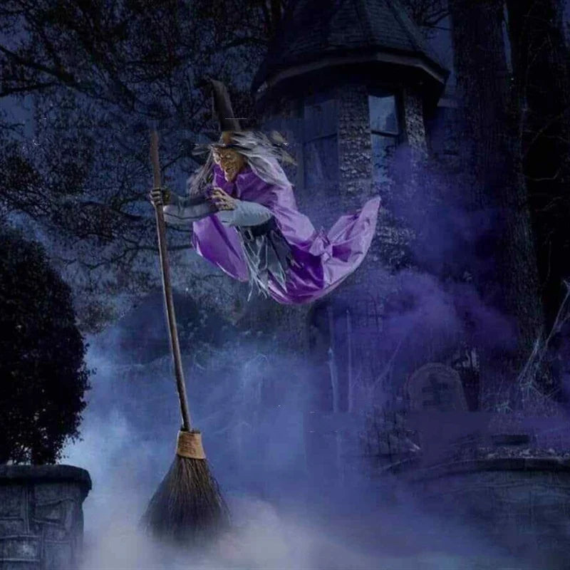 Large 6-foot animated floating witch decoration for outdoor Halloween, with lifelike facial features and flowing purple skirt