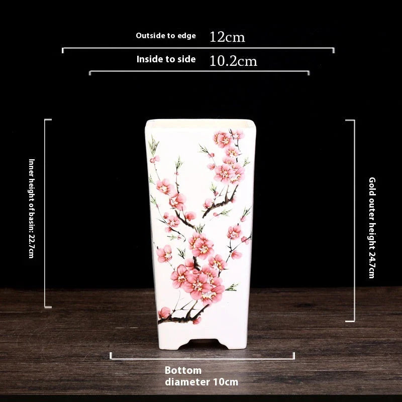 Elegant square ceramic planter in white with a Chinese-inspired design, suitable for indoor plants like asparagus fern and orchid.