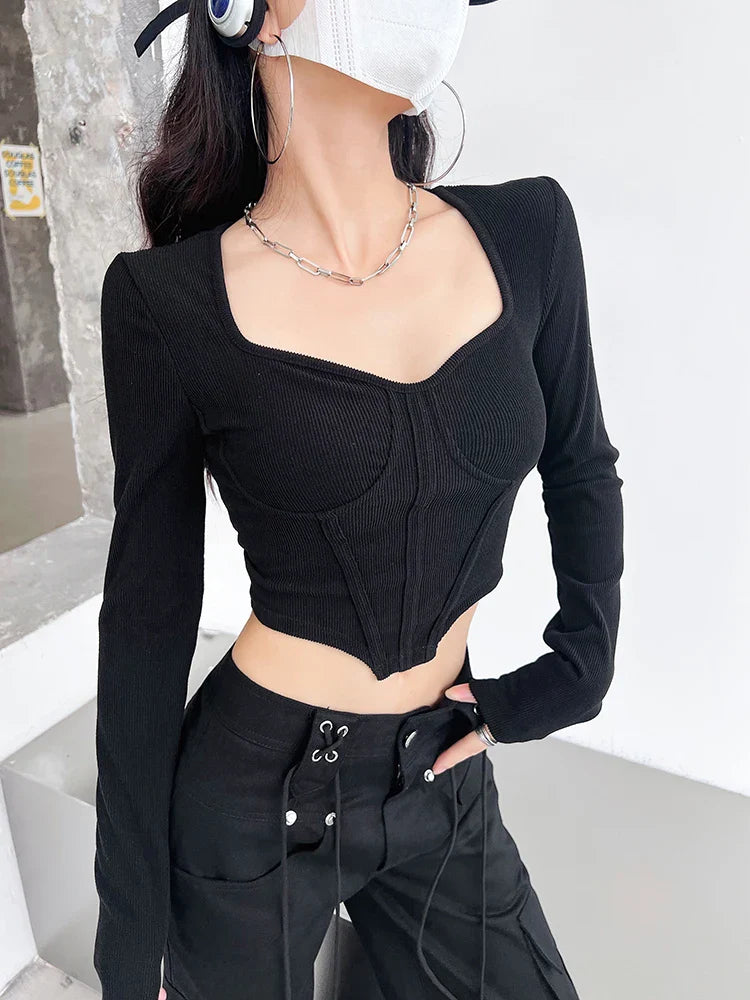 A stylish slim-fit short autumn top with an open waist design, made of premium polyester fabric with long sleeves and a square collar.