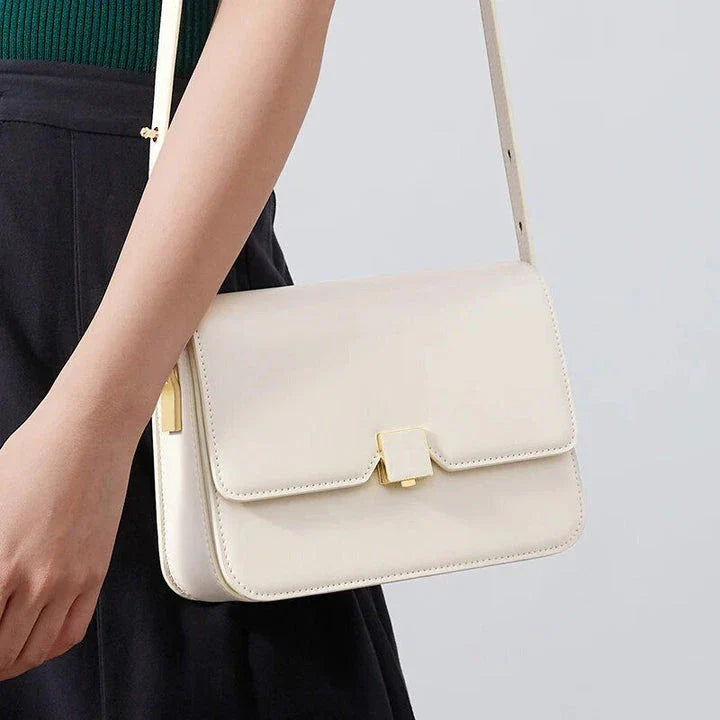 Elegant and sophisticated cow leather women's shoulder and crossbody bag with adjustable strap and spacious interior