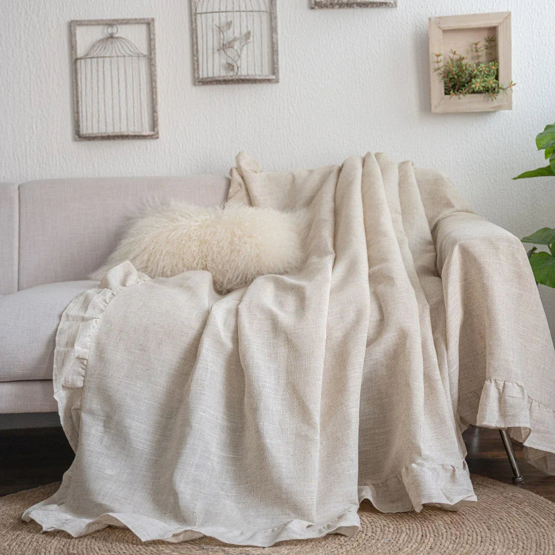 Elegant ruffled sofa cover in a variety of solid colors, offering a timeless American style for any living room